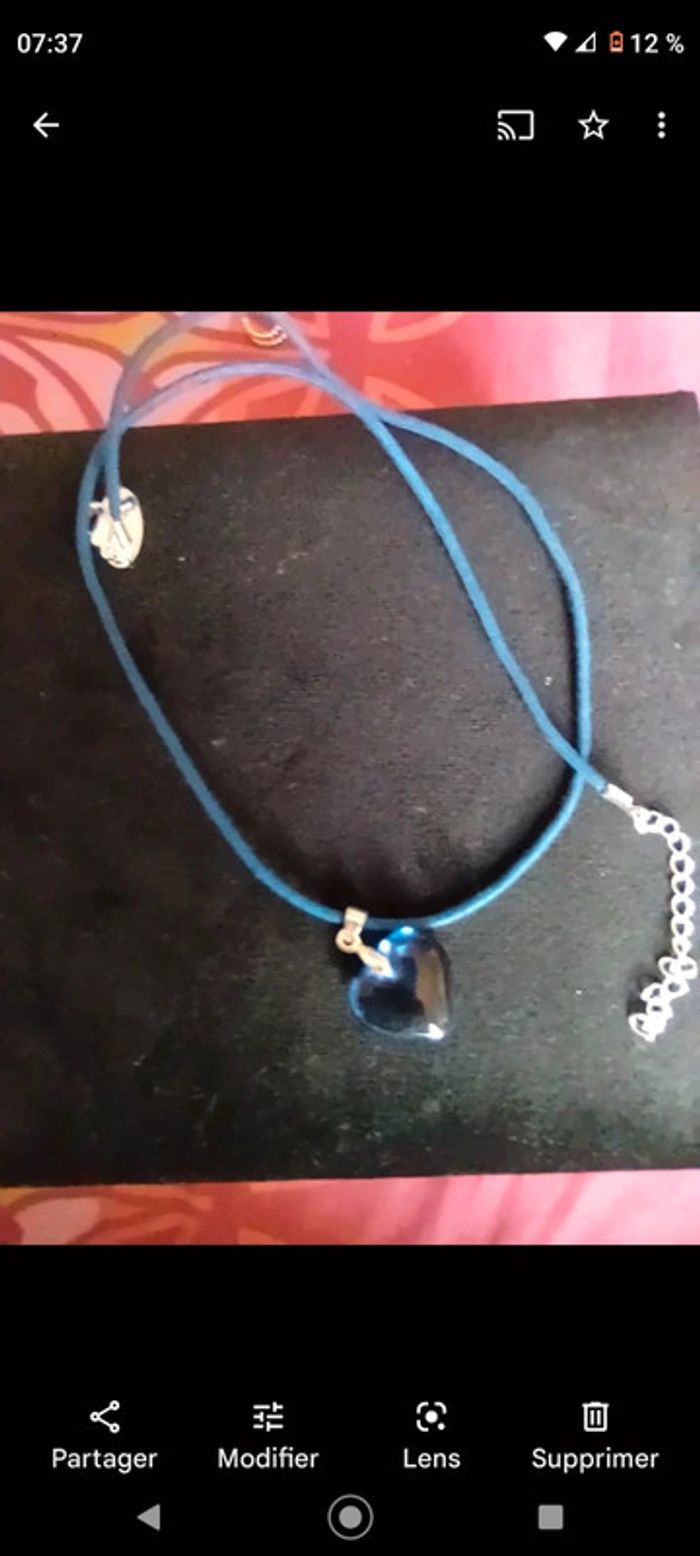 Collier lien et coeur bleu