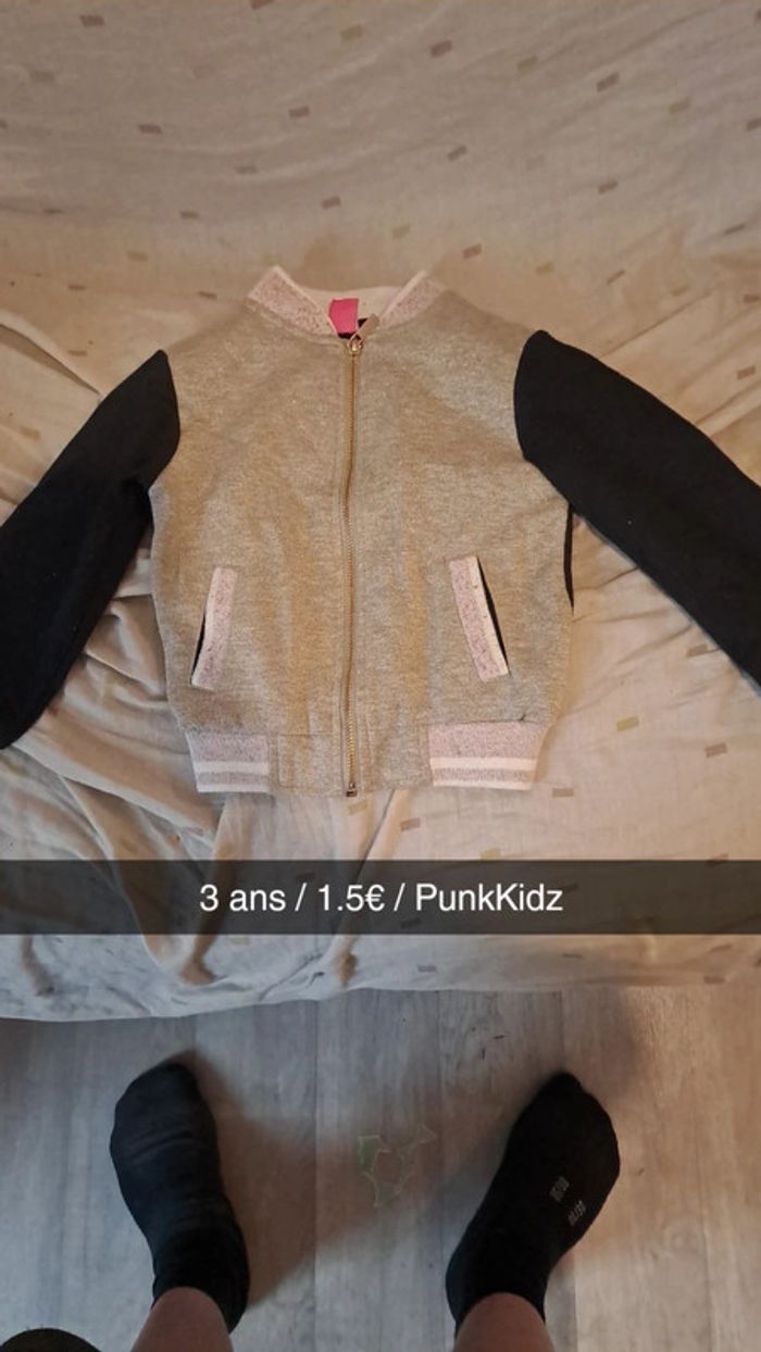 Veste à manche noir