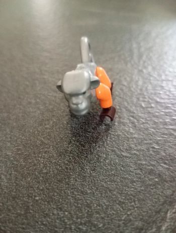 Monkey with dark brown hands and feet,1 flat silver.
