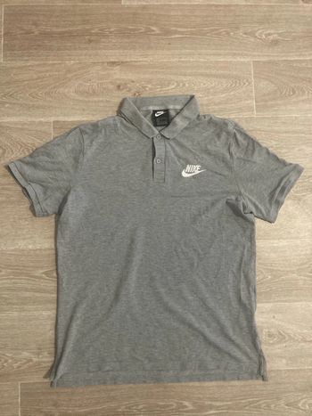 Polo Nike gris