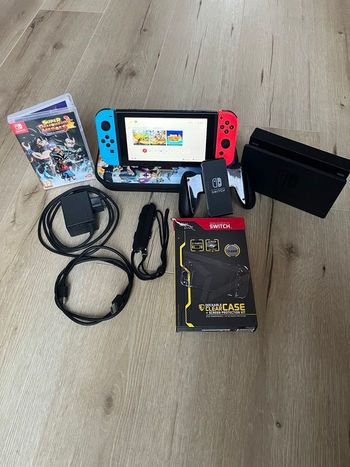 Nintendo Switch v2 Néon complète + 1 jeu  - Bon état 