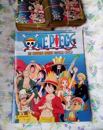 Lot Panini One Piece Un nouveau monde Un album vide et 49 pochettes scellées