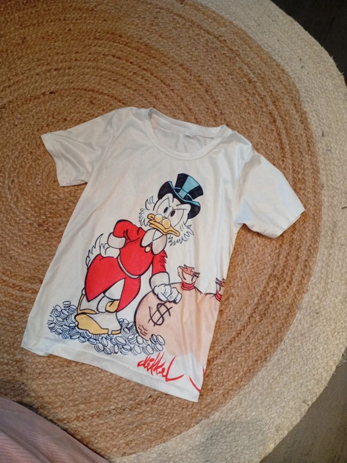T shirt type acrylique 8 ans super état comme neuf Picsou - photo numéro 2