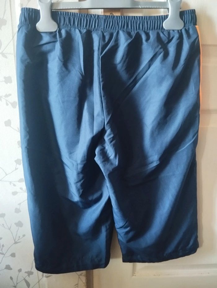 Neuf Bermuda Lotto taille 14 ans bleu marine et orange sport - photo numéro 2