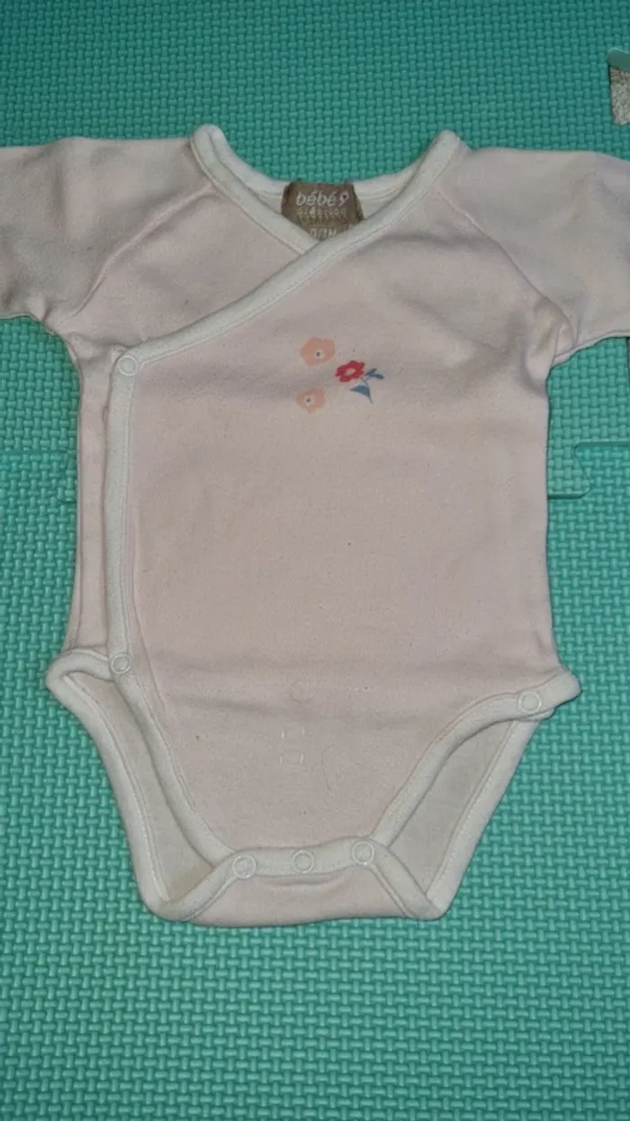 Body manche longue 0/1 mois en bon état
