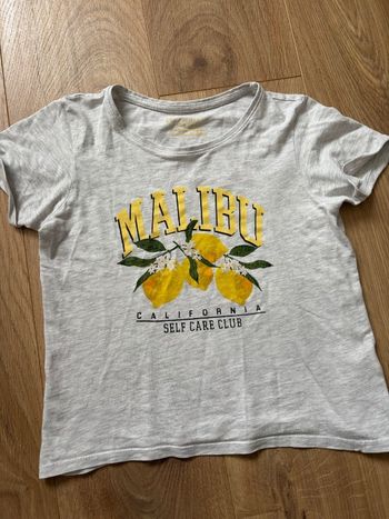 T-shirt gris jaune malibu fille 9 ans primark