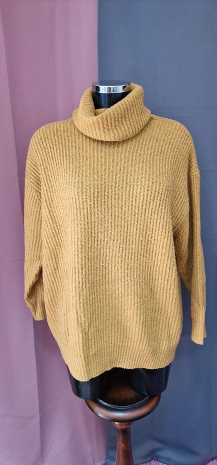 Pull col roulé