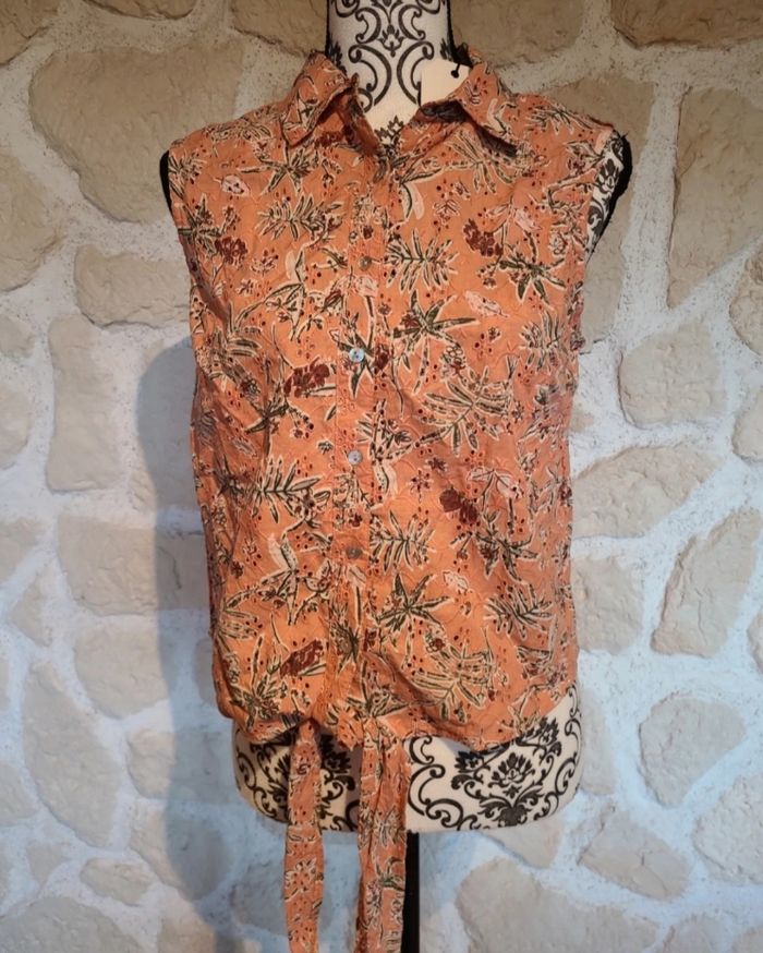 Blouse sans manche  fleurie taille s femme neuf