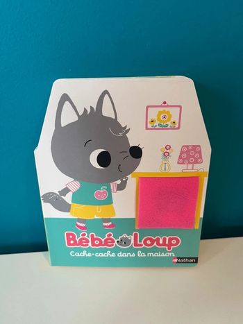 Livre cache cache bébé loup avec volets en feutrines