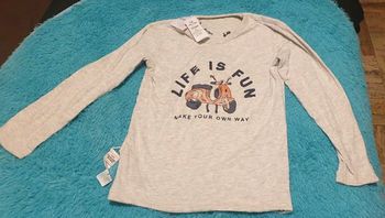 Vêtement réversible garçon 10 ans.