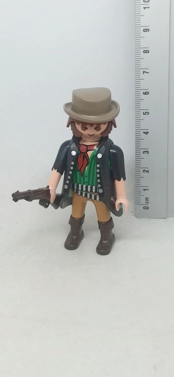 Homme Cowboy avec haut vert et manteau noir playmobil