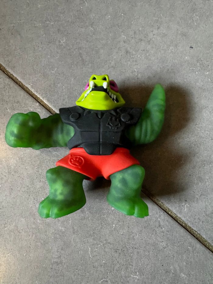 Figurine goo jit zu - Crocodile / Dinosaure / Aligator - Vert, noir, rouge & violet