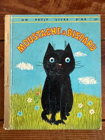 Livre ancien vintage Moustache a disparu chat noir deux coqs d’or Un petit livre d’or