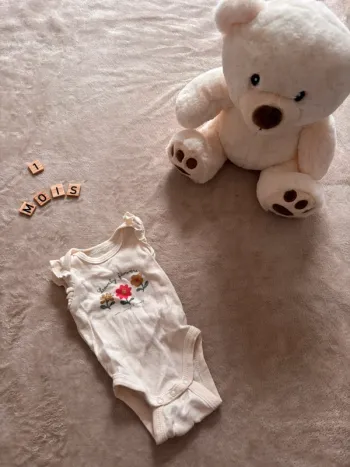 Body sans manches à fleurs - 1 mois