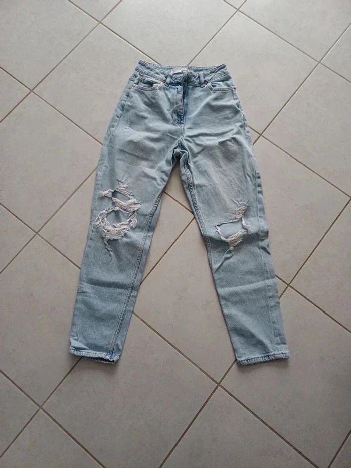 Jean femme à trou taille 34