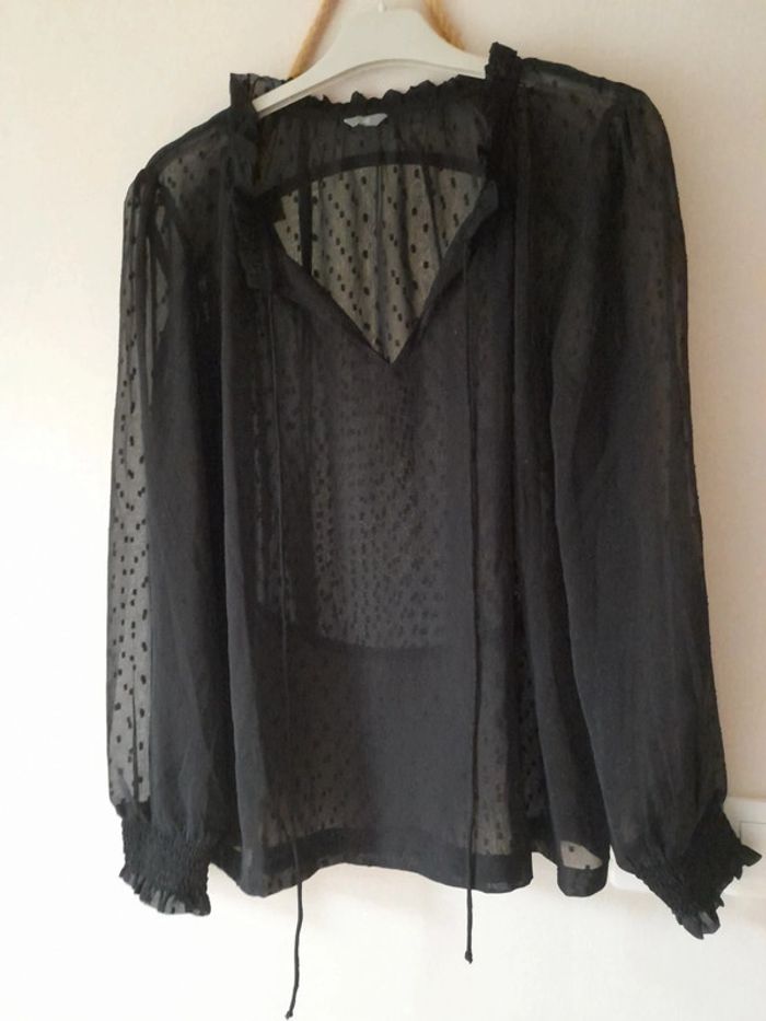 Blouse noire transparente 42