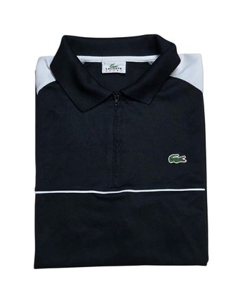 Polo Lacoste taille 5 / L noir et blanc Très bon état