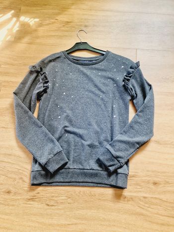 Pull avec petite perle