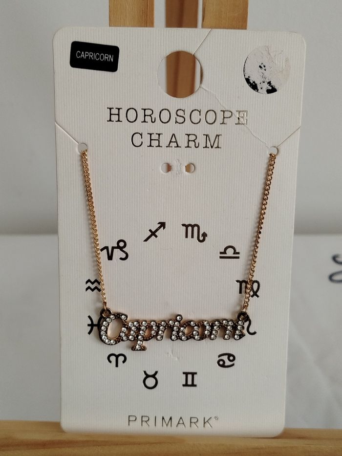Collier fantaisie astrologique capricorne Primark