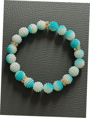 Bracelet turquoise blanc et doré en perles taille unique jamais porté