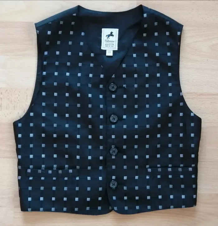 Boléro gilet sans manches noir 6 ans