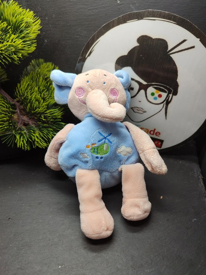 doudou peluche les bébés d'elyséa éléphant bleu rose hélicoptère nuage flor albi sabadell - photo numéro 1