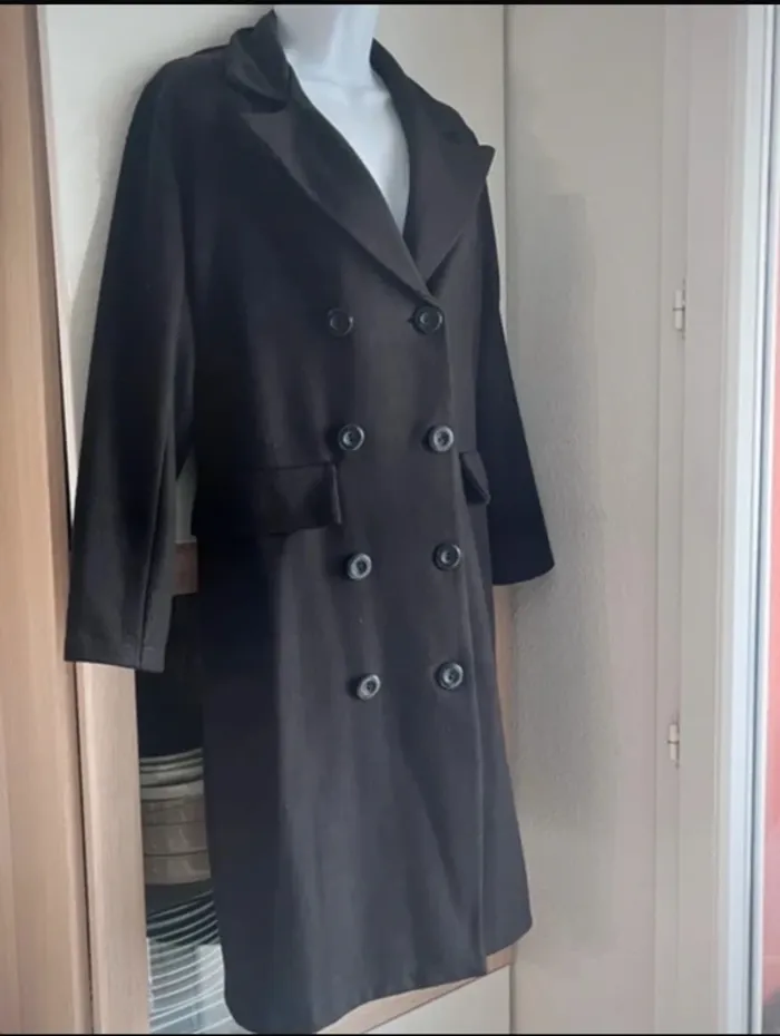 Manteau noir double boutonnage
