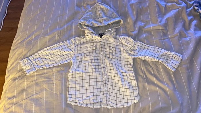 Chemise à carreaux avec capuche