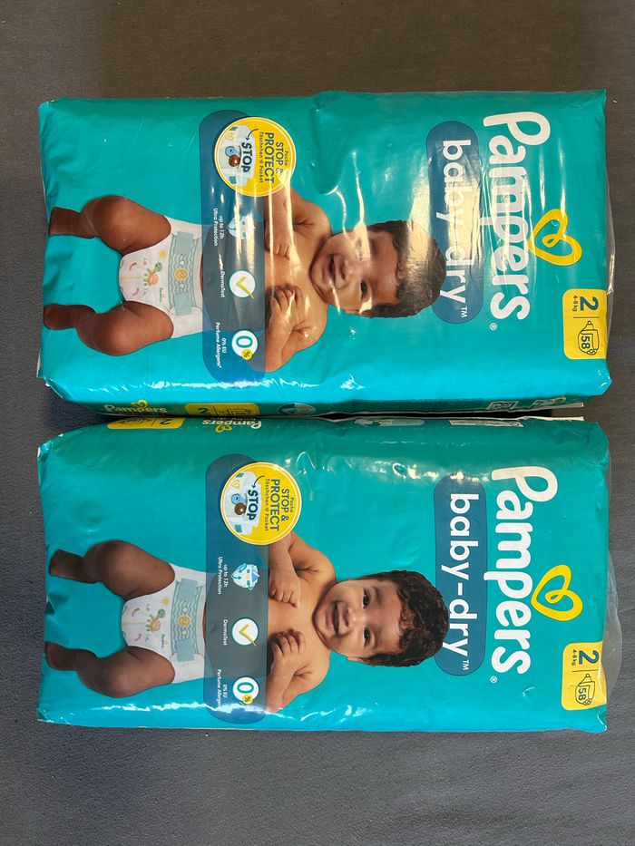 Lot 4 paquets couches Pampers taille 2