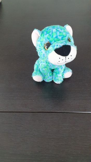 Peluche tigre bleu et vert