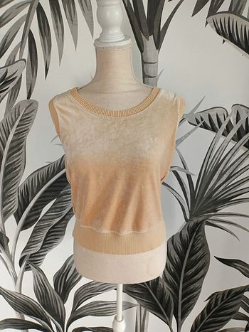 Très beau pull sans manche