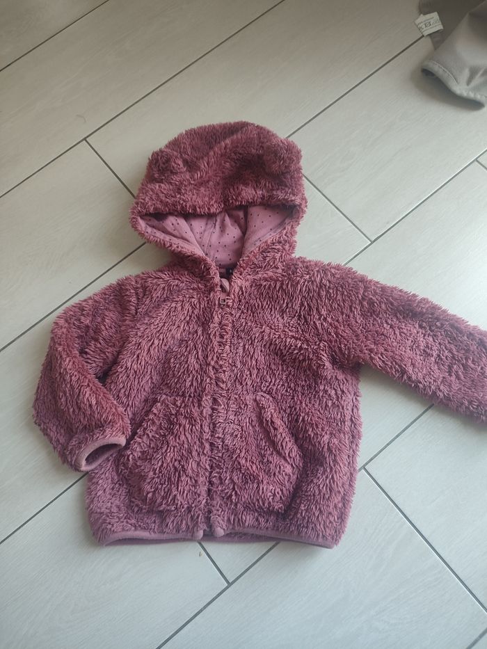 Polaire a  capuche