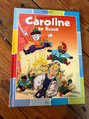 Correct+ Livre Caroline en Russie Orange édition damiers bd album multicolore