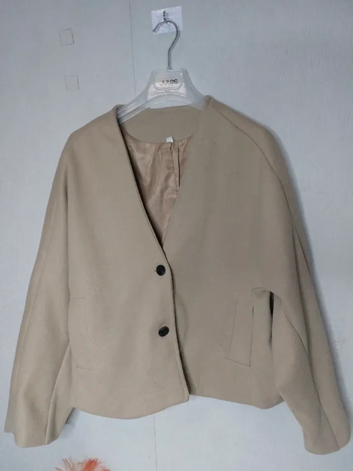 Veste beige Taille M qui taille L