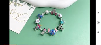 Bracelet 19 cm stitch Disney neuf avec charm magnifique