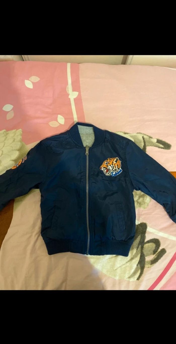 Veste réversible taille 6 ans