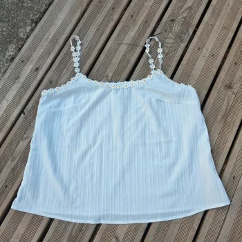 Débardeur marguerite taille 0XL