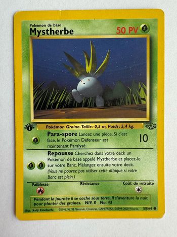 Carte Pokémon Mystherbe 58/64 - Jungle édition 1 Wizards - FR - Usée