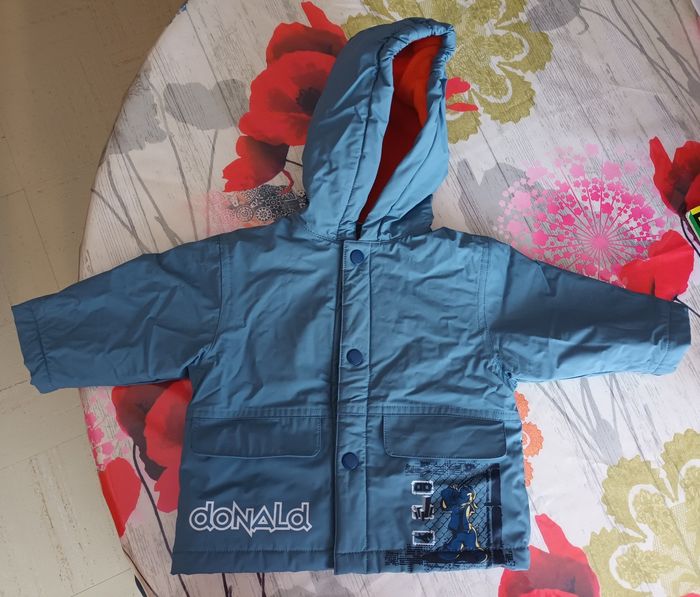 Manteau  Donald   6 mois   .Disney  bleu