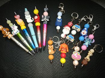 Stylos ou portes clés 3 e pièces