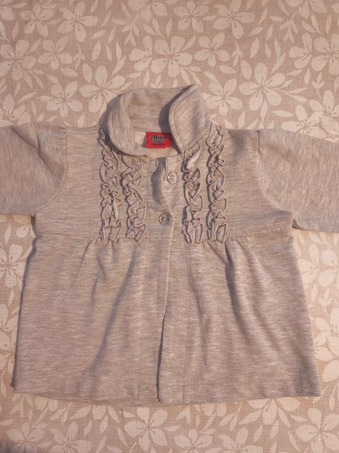 Veste grise ouverte