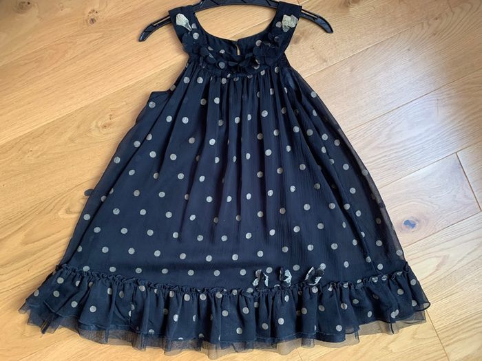 Très jolie robe noire à pois dorés 8 ans tbe - photo numéro 4