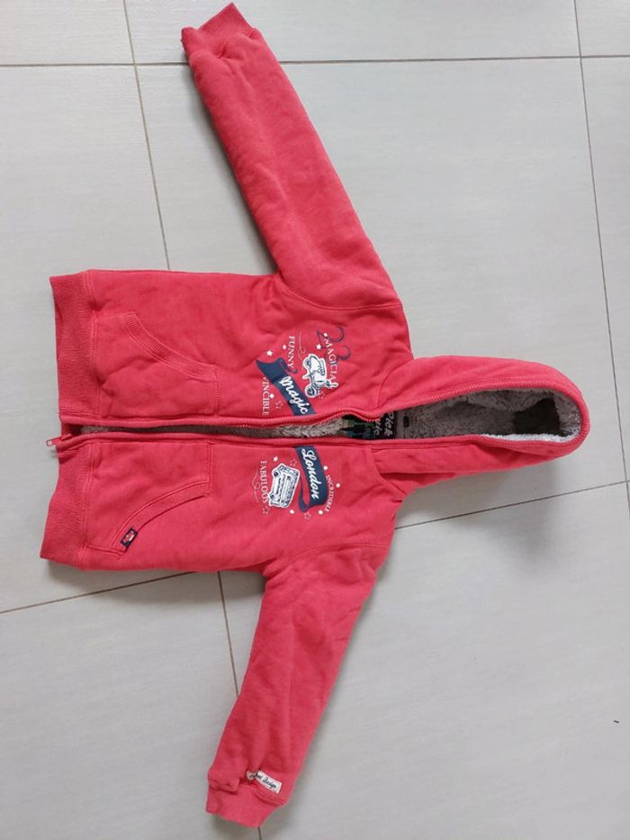 Manteau fourré rouge