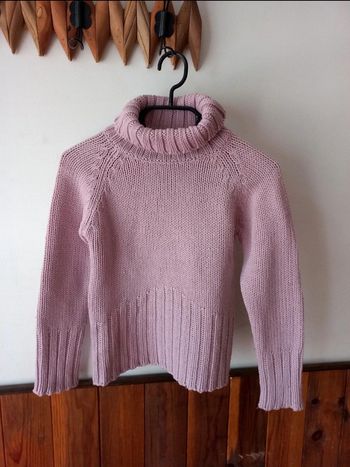 Pull rose col roulé