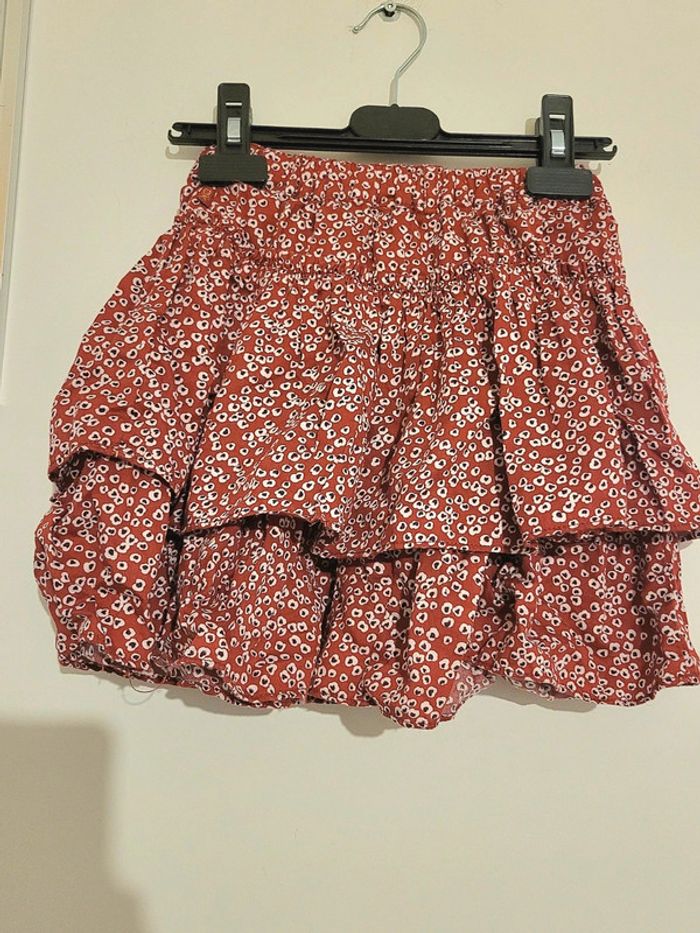 Jupe rouge- bordeaux à fleurs blanches "okaidi" taille 8 ans - photo numéro 4