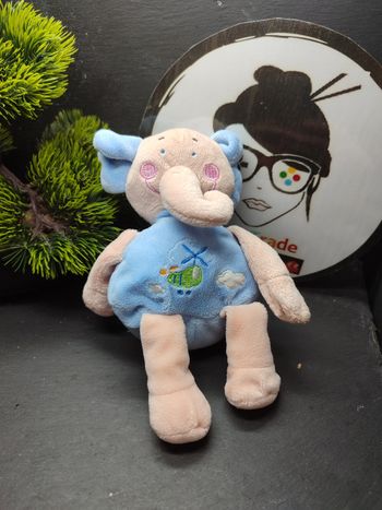 doudou peluche les bébés d'elyséa éléphant bleu rose hélicoptère nuage flor albi sabadell