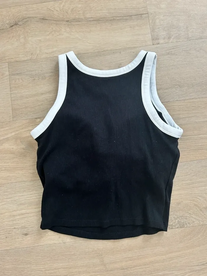 Top Uniqlo taille XS noir et blanc - photo numéro 3