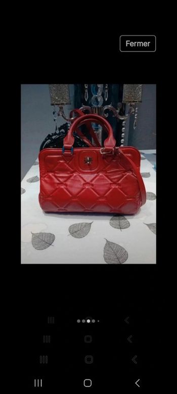 Sac longchamp bandoulière avec quelques petites imperfections voir les photos