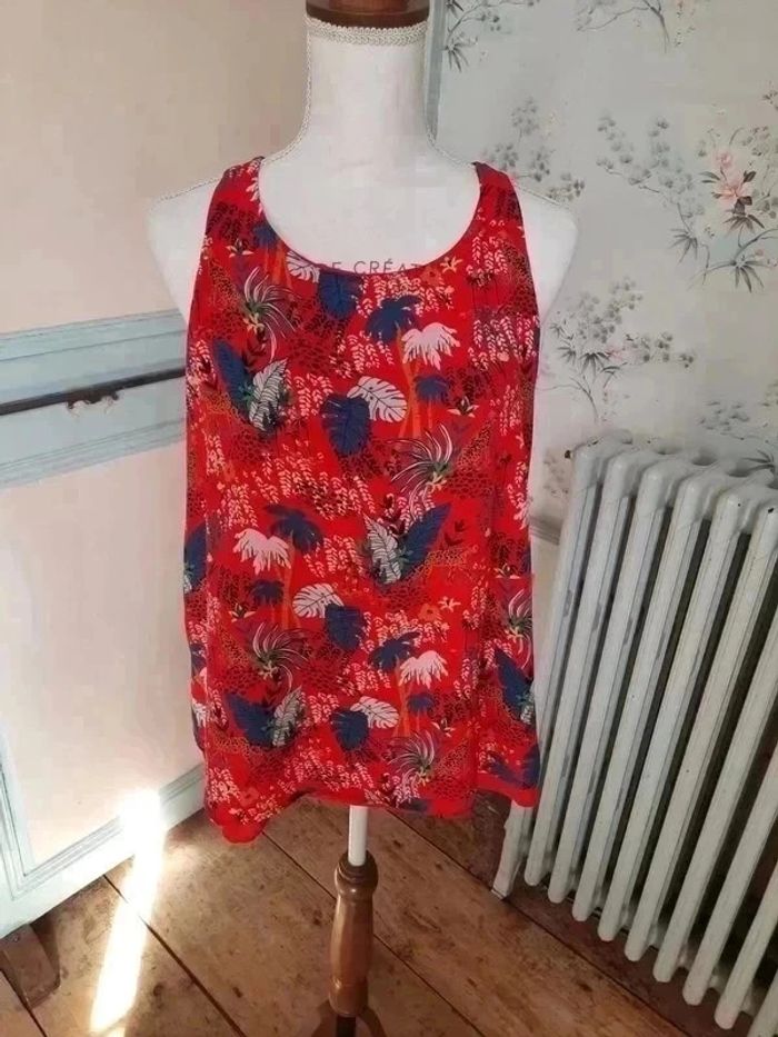 Chemisier sans manches Promod taille 38 en très bon état.