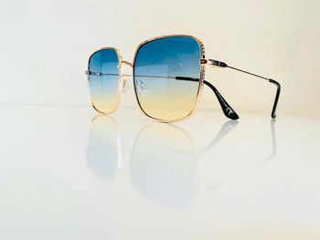 Lunette de soleil femme carrée dorée verres bleus dégradés uv protection catégorie 2